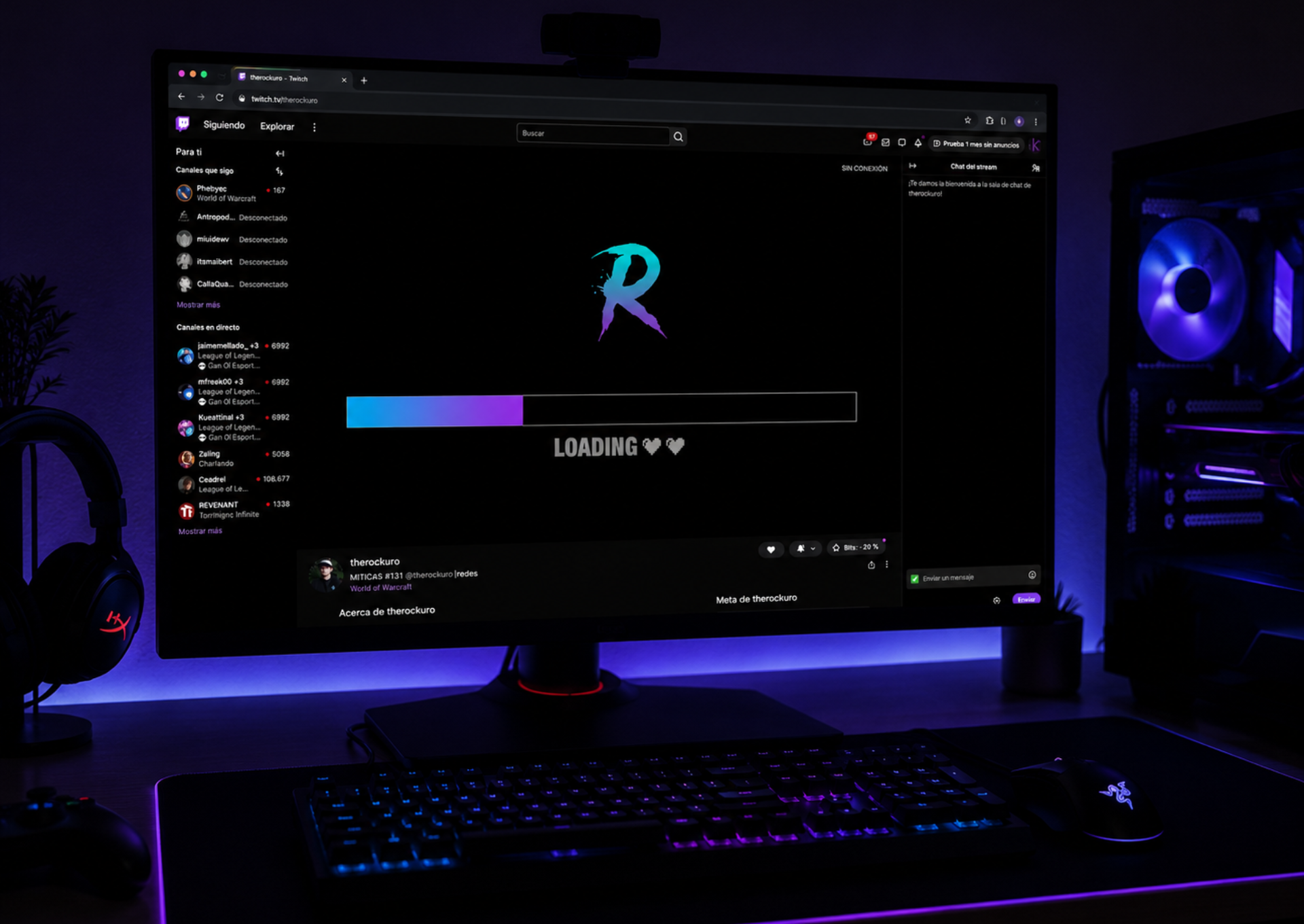 A gaming PC setup illuminated in shades of blue and purple. The screen displays therockuro's Twitch channel with a player showing a stylized 'R', a gradient loading bar, and the text 'LOADING'. Headphones, a keyboard, a mouse, and the PC tower are visible on either side.