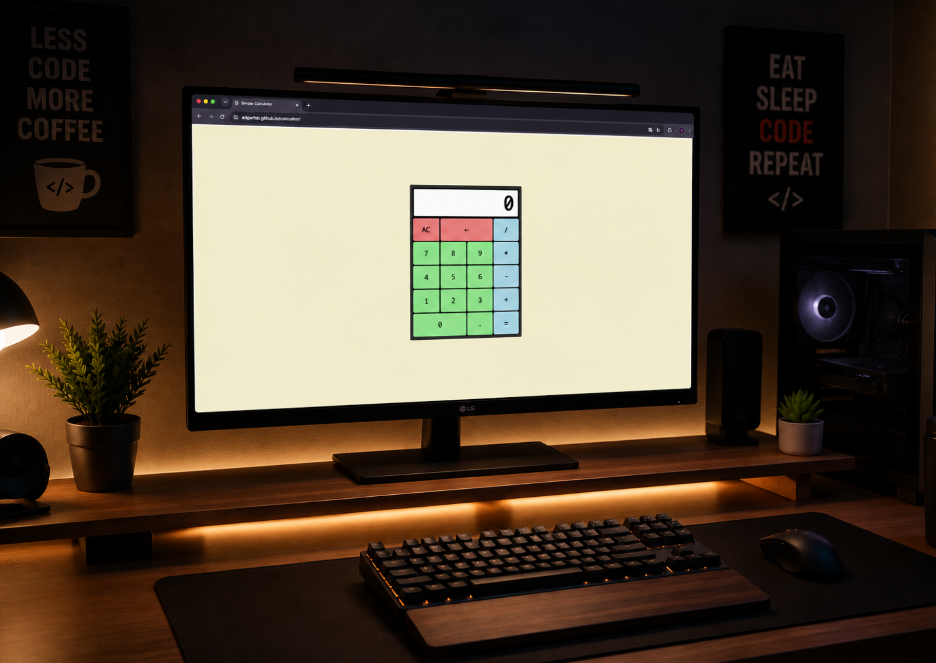 Photograph of a work desk with warm lighting. The central monitor displays an interactive web calculator with buttons in shades of red, green, and blue against a light background. The wooden desk includes a mechanical keyboard, a monitor lamp, and motivational posters about programming on the wall.